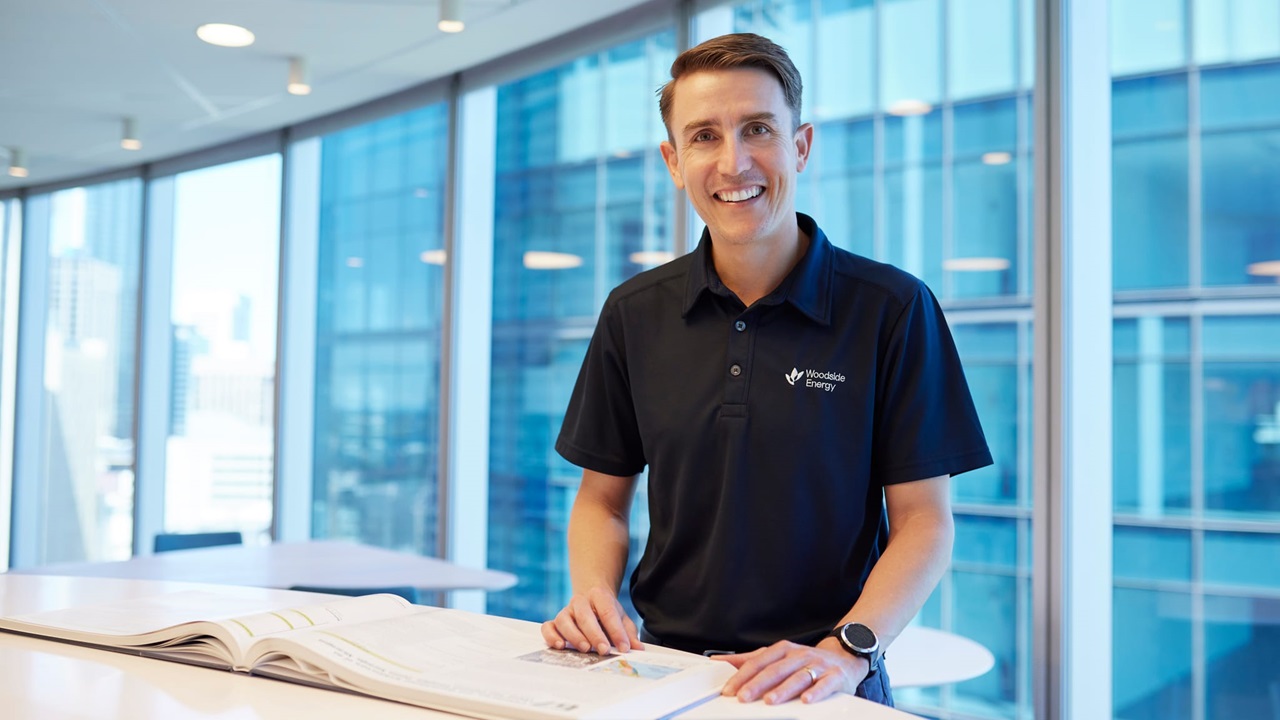 Smiling Woodside employee in the Perth Head Office